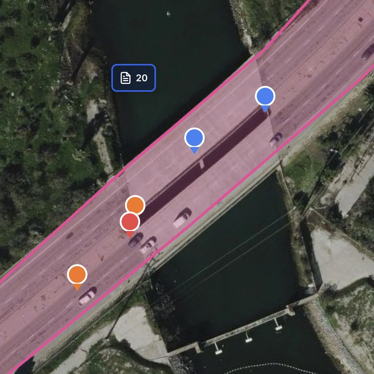 Satellite map showing the same construction issue pins in the field